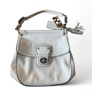 2011 Coach 70th Anniversary Willis Saddle bag in white leather.